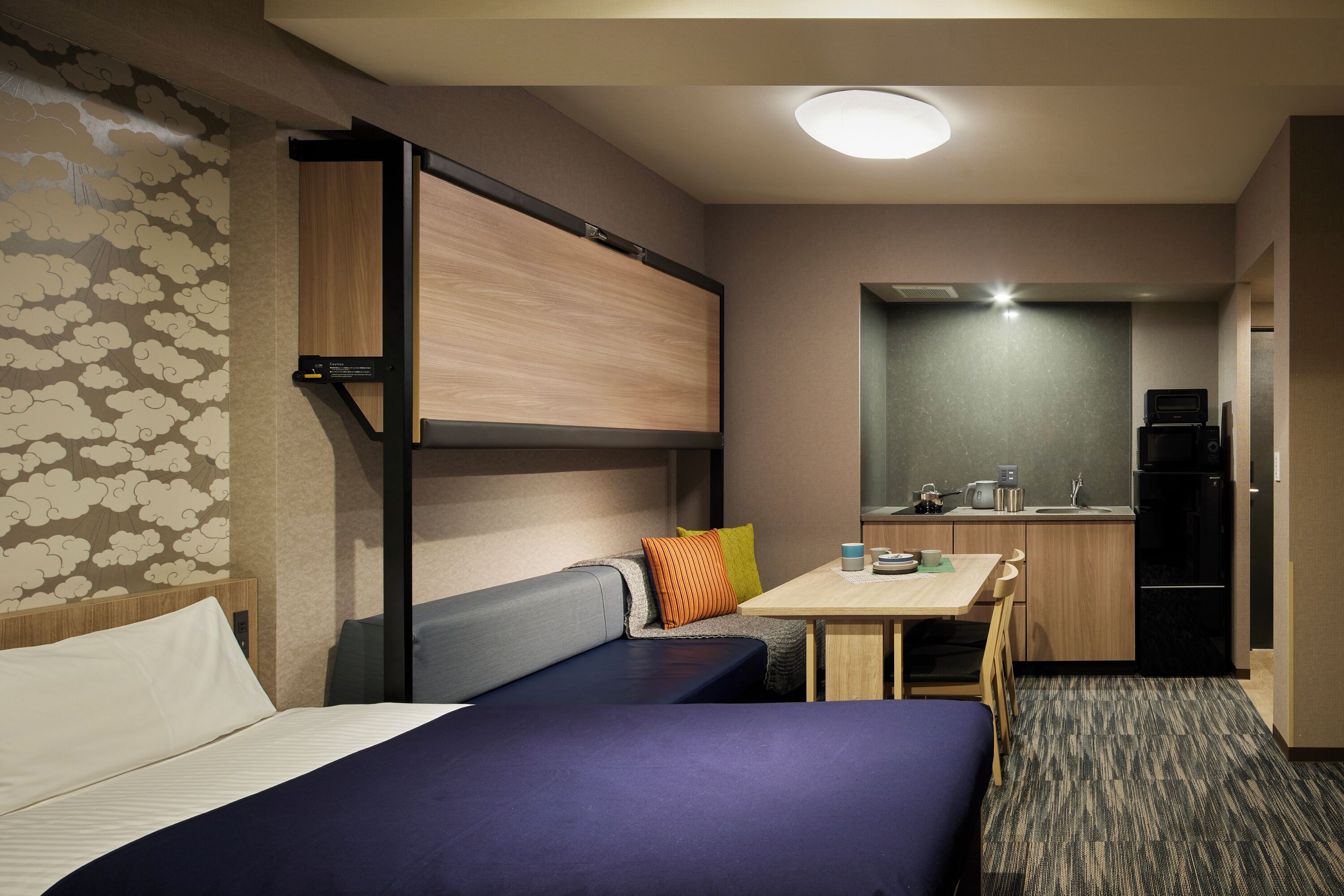 Standard Apartment | Down comforters, in-room safe, blackout drapes, iron/ironing board
