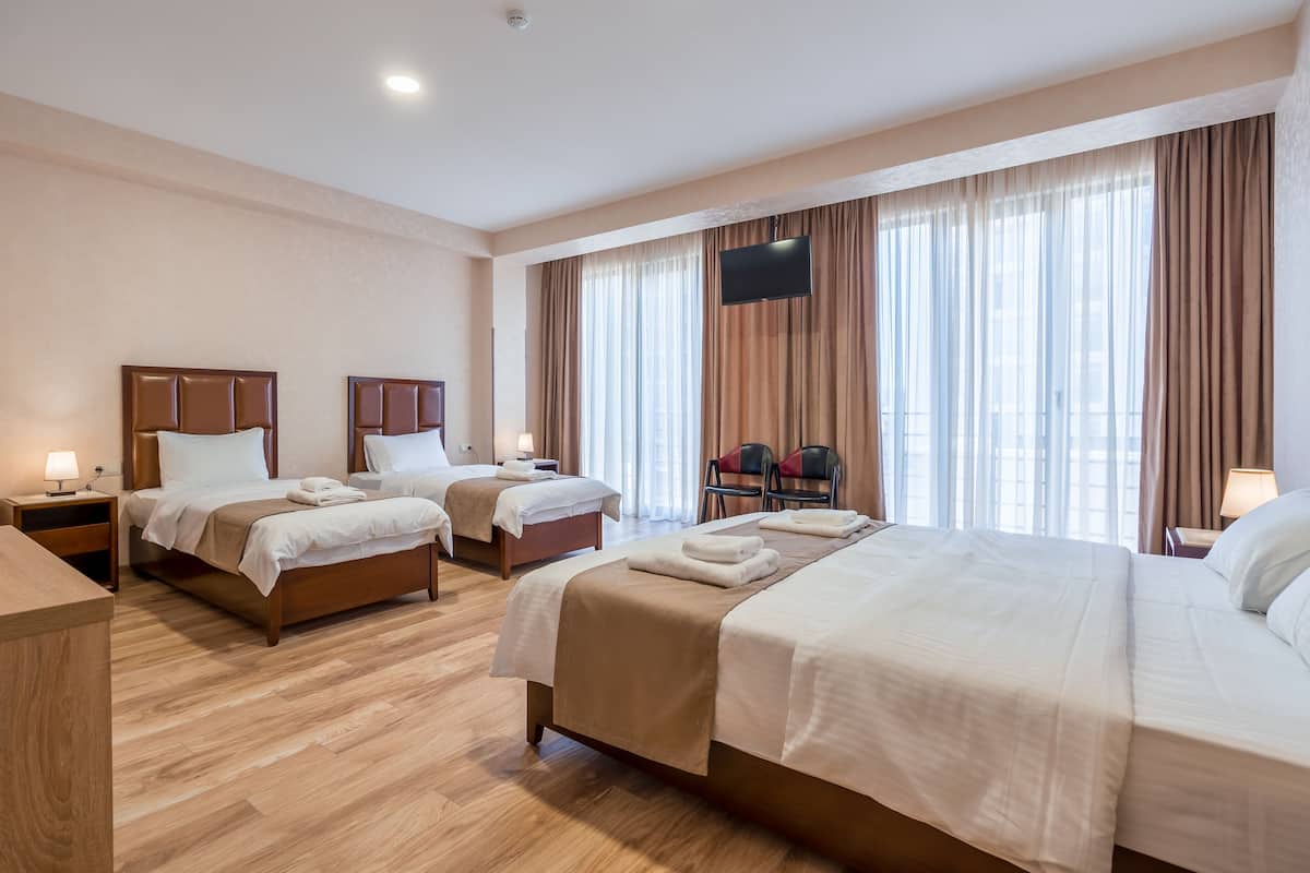 Classic Triple Room | Minibar, blackout drapes, iron/ironing board, free WiFi