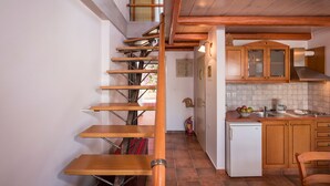 Fridge, cookware/dishes/utensils, dining table, kitchen island - Orionas Village - Two bedroom Maisonette (Chania)