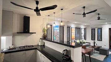 Fridge, stovetop, coffee/tea maker, electric kettle