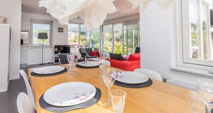 The beautiful, tranquil corner location, surrounded by green landscape and with electrical patio cov