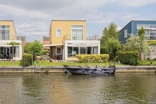 Beautiful home with roof terrace and a view of the water.
