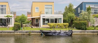 Beautiful home with roof terrace and a view of the water.