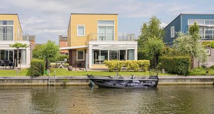 Beautiful home with roof terrace and a view of the water.