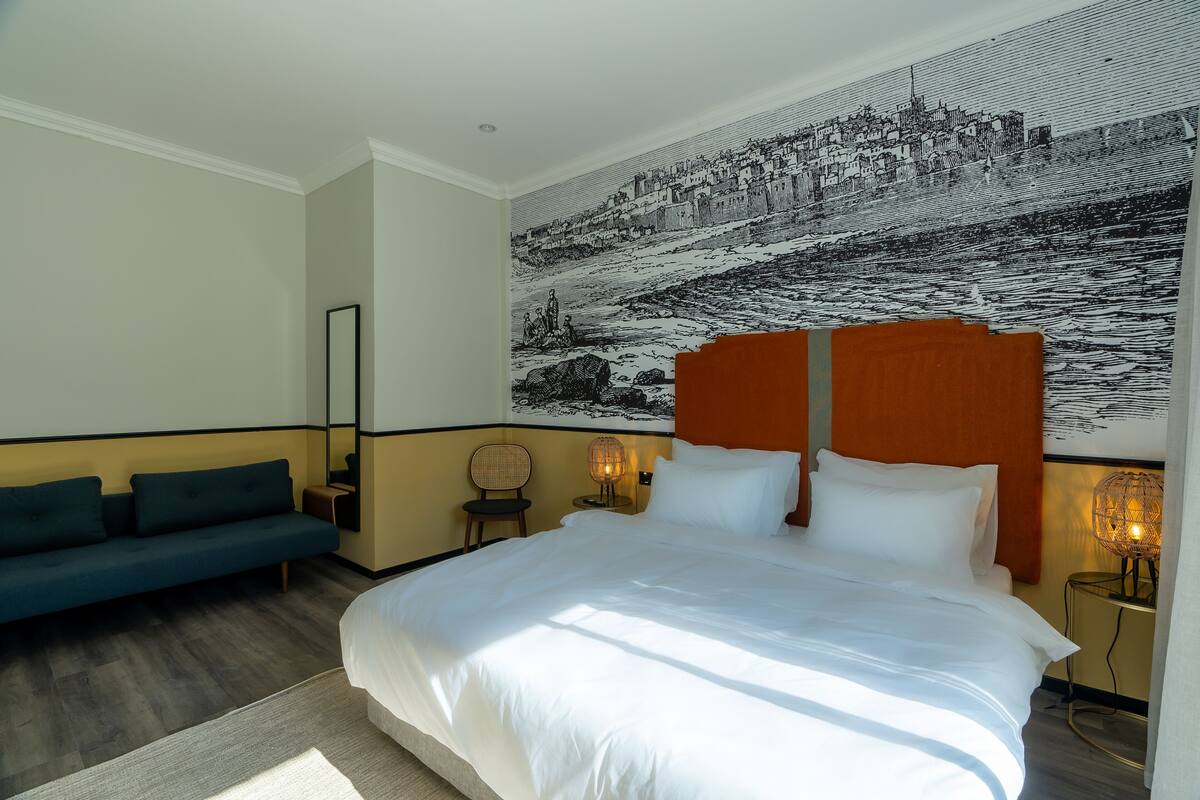 Classic Triple Room, Partial Sea View | Egyptian cotton sheets, premium bedding, minibar, desk