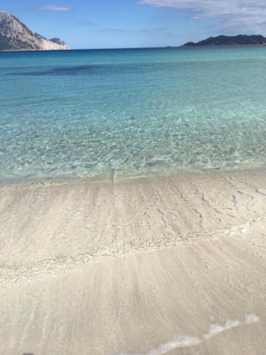 Una spiaggia nelle vicinanze, lettini da mare