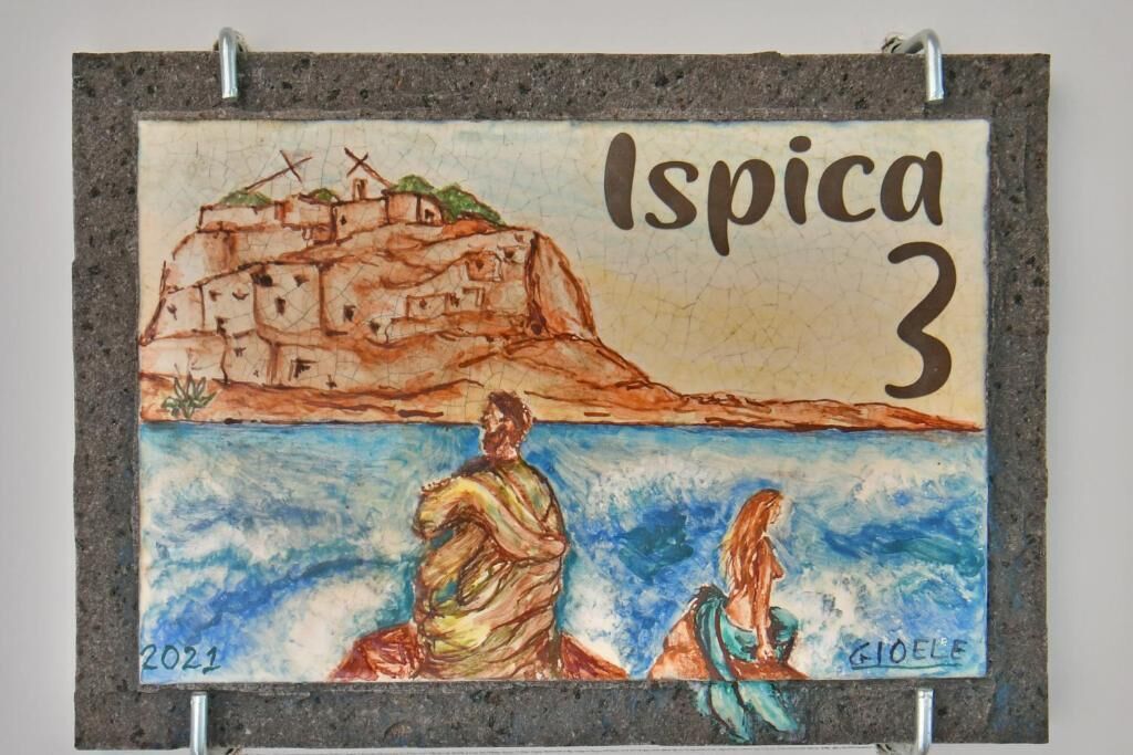 A painting of a coastal scene with a mountain and two figures by the sea, labeled "Ispica 3" and "2021".