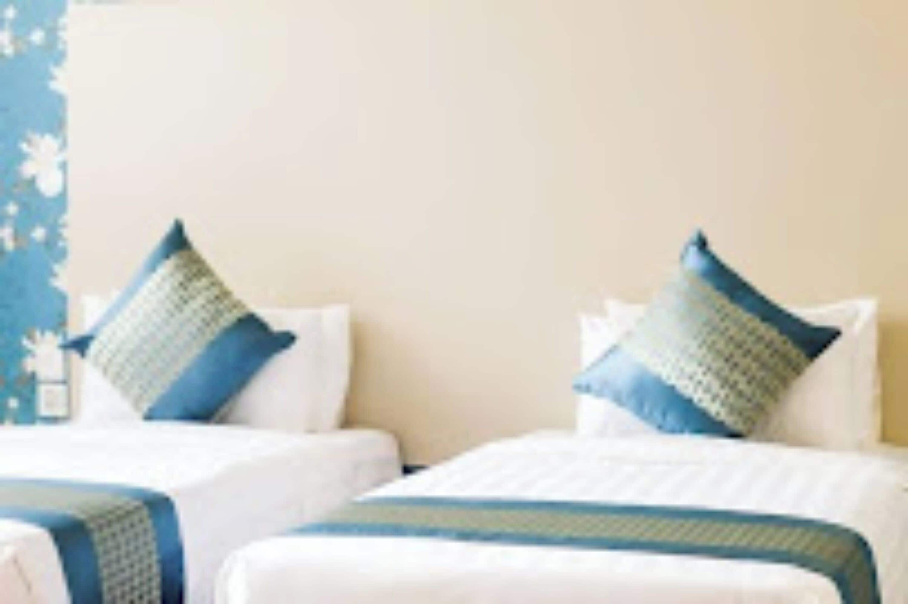 Habitación Deluxe doble | Ropa de cama de alta calidad, colchones Select Comfort, caja fuerte