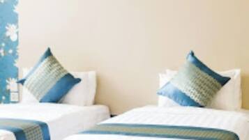 Habitación Deluxe doble | Ropa de cama de alta calidad, colchones Select Comfort, caja fuerte