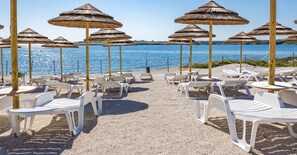 Private beach, white sand, windsurfing