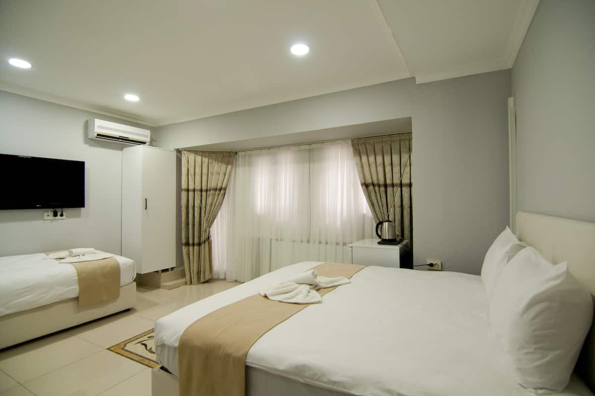Standard Triple Room | 迷你吧、熨斗/熨板、免费 WiFi、床单