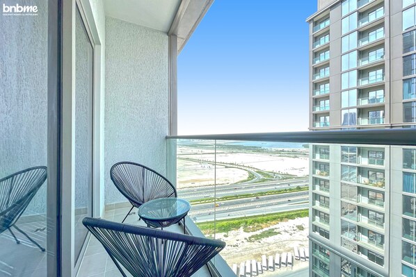 Balcony - bnbme | Sobha Creek Vistas | 1 BDR (Dubai)