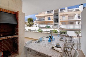Outdoor dining - Apartment "Maré Cheia SL015" with Shared Pool & Wi-Fi (Santa Luzia)