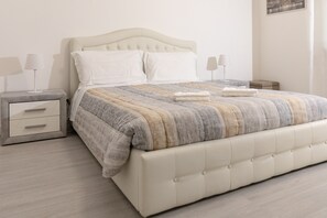 1 habitación, tabla de planchar con plancha, wifi gratis y ropa de cama 