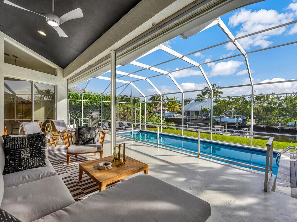 CURLEW CANAL - Modern Waterfront Home with Heated Pool