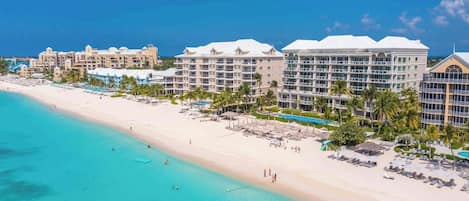 On the beach, sun loungers, beach towels