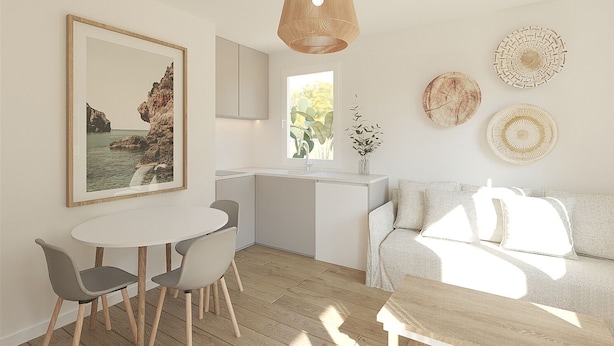 A modern kitchen with a dining area, a sofa, and decorative wall art. - Lavendel Apartments (Ses Salines)