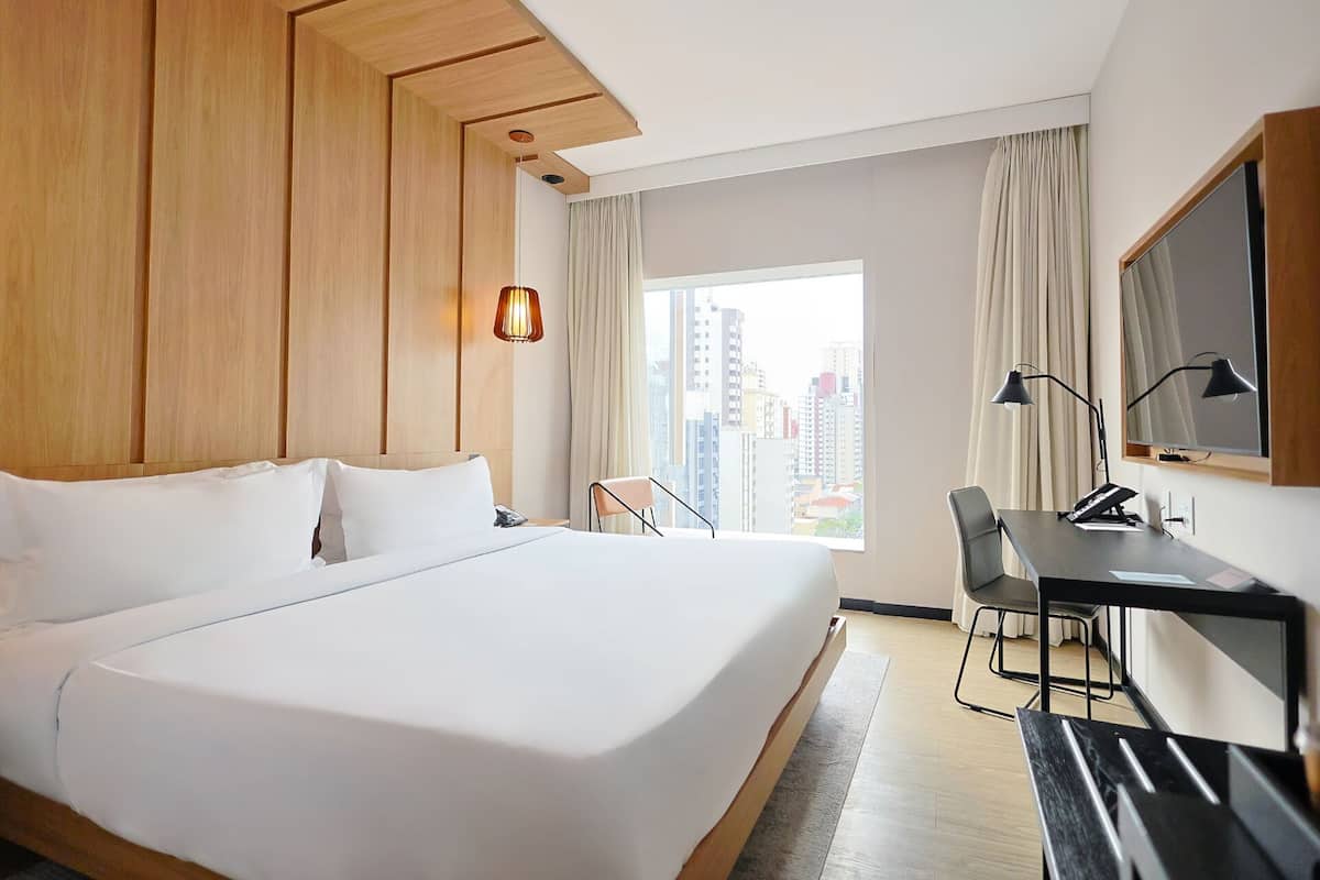 Chambre exécutive, 1 très grand lit | Minibar, système d’insonorisation, lit de bébé (gratuit)