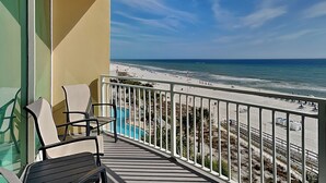 A balcony with a view of the beach and ocean. - Aqua 404 | Amazing Views, Incredible Amenities & Location! (Panama City Beach)