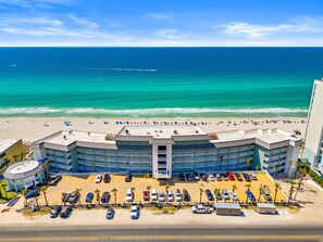 On the beach - Continental #107 | Ground Floor, Gulf Front View + Amenities (Panama City Beach)