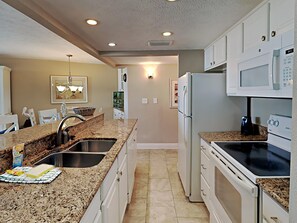 Fridge, microwave, oven, stovetop - Edgewater Tower I #705 | Incredible Amenities + Gulf VIews! (Panama City Beach)