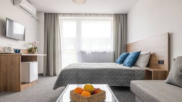 Comfort Quadruple Room | Iron/ironing board, free cribs/infant beds, travel crib, free WiFi