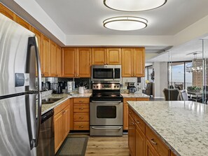 Coffee/tea maker, fridge, microwave, oven