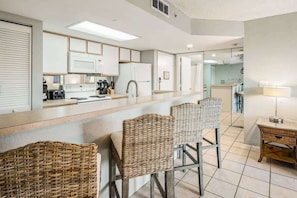 Coffee/tea maker, fridge, microwave, oven