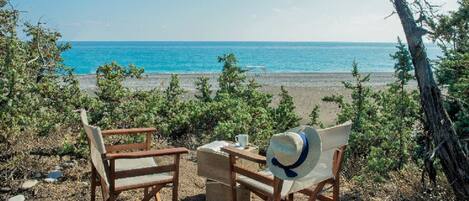 On the beach, sun-loungers, beach towels