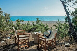 On the beach, sun-loungers, beach towels