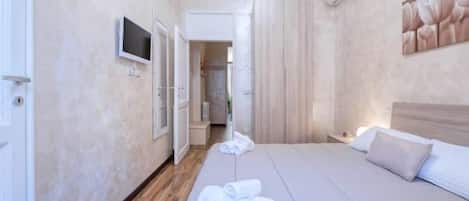 Traditional Apartment | Premium bedding, down comforters, travel crib, free WiFi