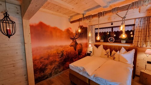 Edelweiss romantic suite with fireplace & Swiss stone pine sauna