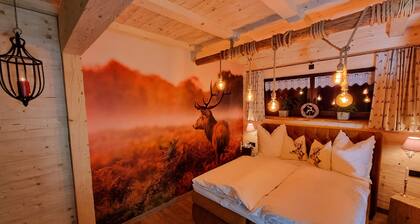 Edelweiss romantic suite with fireplace & Swiss stone pine sauna