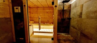 Edelweiss romantic suite with fireplace & Swiss stone pine sauna