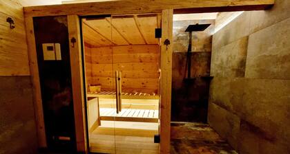 Edelweiss romantic suite with fireplace & Swiss stone pine sauna