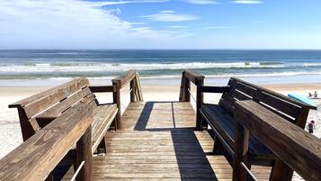 On the beach, sun loungers, beach towels