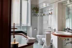 Hair dryer, bidet, towels, shampoo
