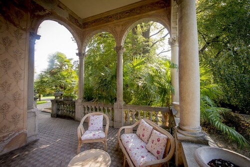 Villa in pure Art Nouveau style with swimming pool and park