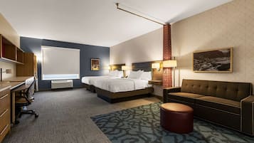 Premium bedding, desk, laptop workspace, iron/ironing board