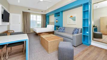 Suite, 1 Queen Bed | Living area | 50-inch LCD TV with cable channels