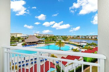 Egyptian cotton sheets, premium bedding, down comforters, in-room safe at Embassy Suites By Hilton Orlando Sunset Walk