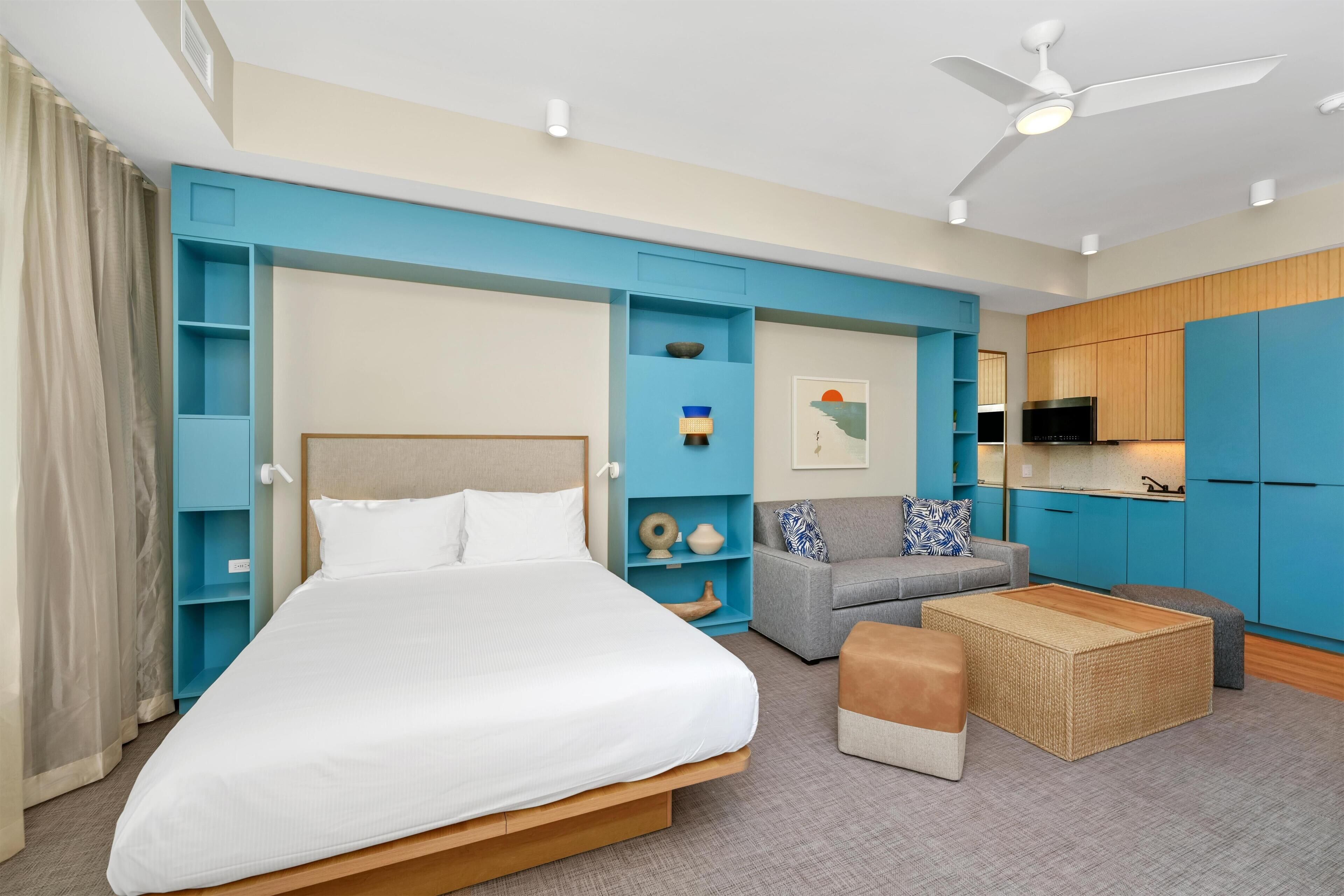 Suite, 1 Queen Bed | Living area | 50-inch LCD TV with cable channels