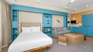 Suite, 1 Queen Bed | Living area | 50-inch LCD TV with cable channels