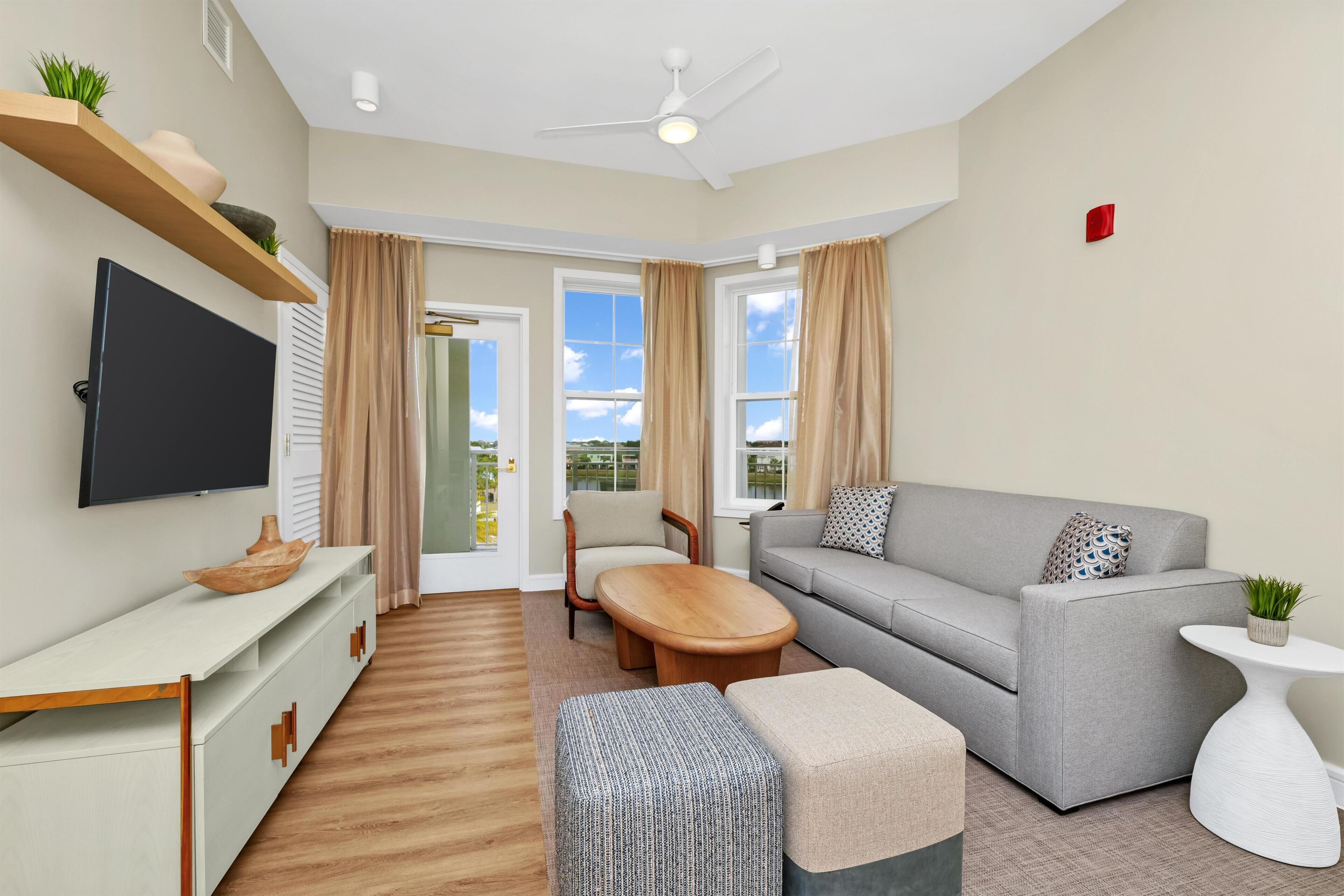 Suite, 2 Bedrooms, Corner | Living area | 50-inch LCD TV with cable channels