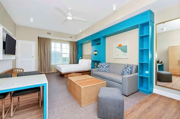 50-inch LCD TV with cable channels at Embassy Suites By Hilton Orlando Sunset Walk