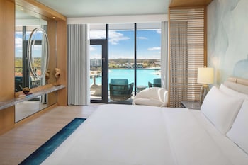 Suite, 1 Bedroom, Balcony (Chairman) | Minibar, in-room safe, desk, laptop workspace at Conrad Orlando