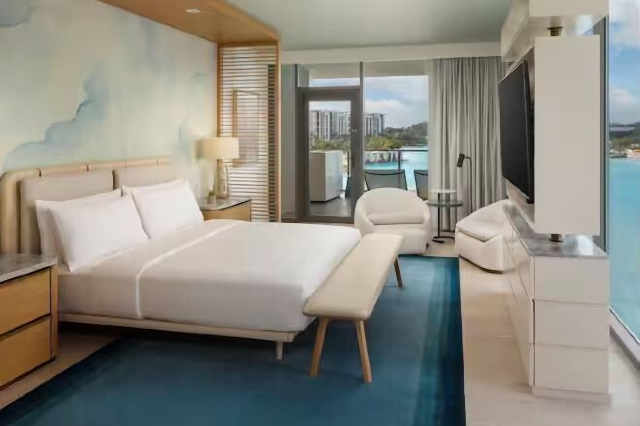 Hypo-allergenic bedding, minibar, in-room safe, desk