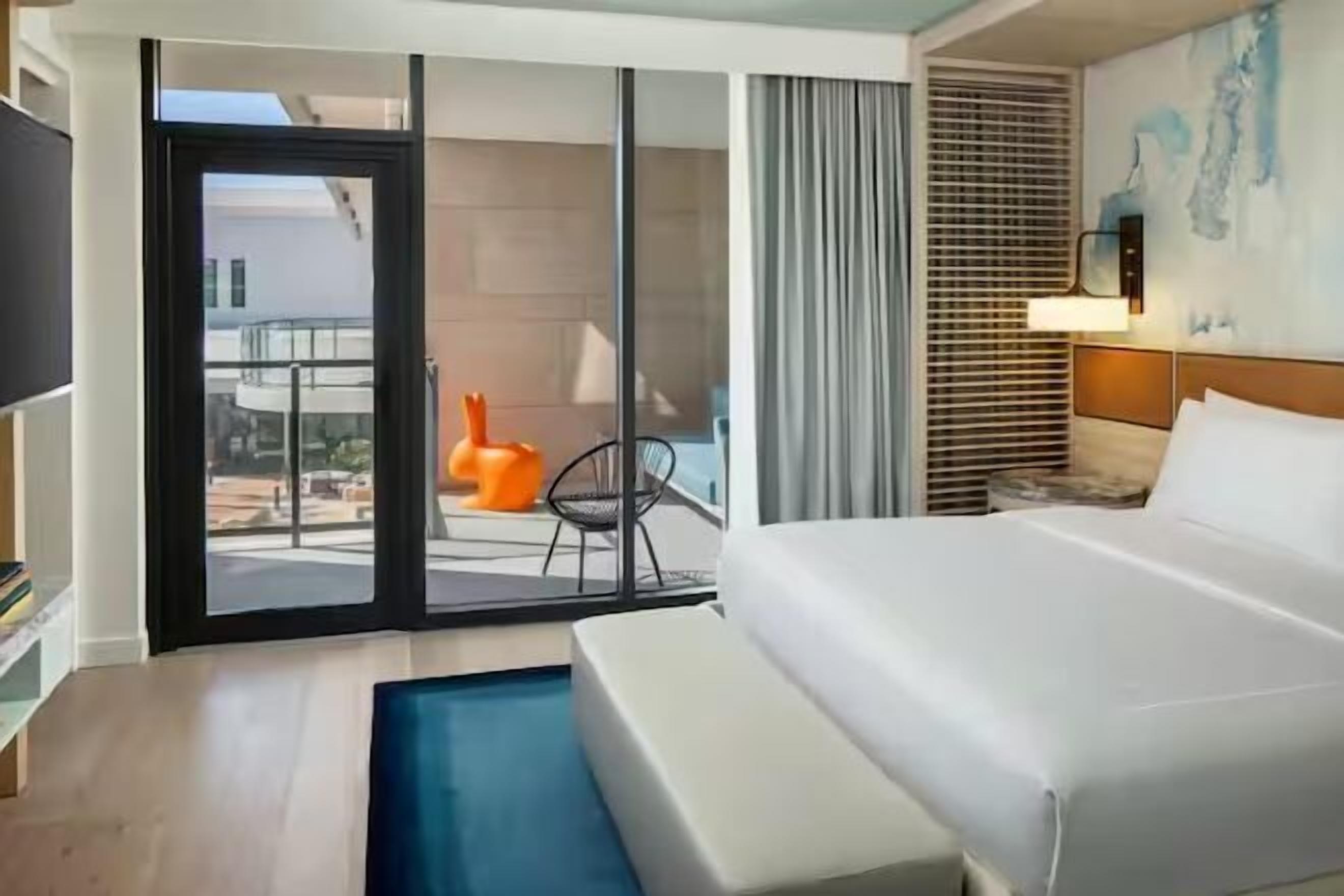 Hypo-allergenic bedding, minibar, in-room safe, desk