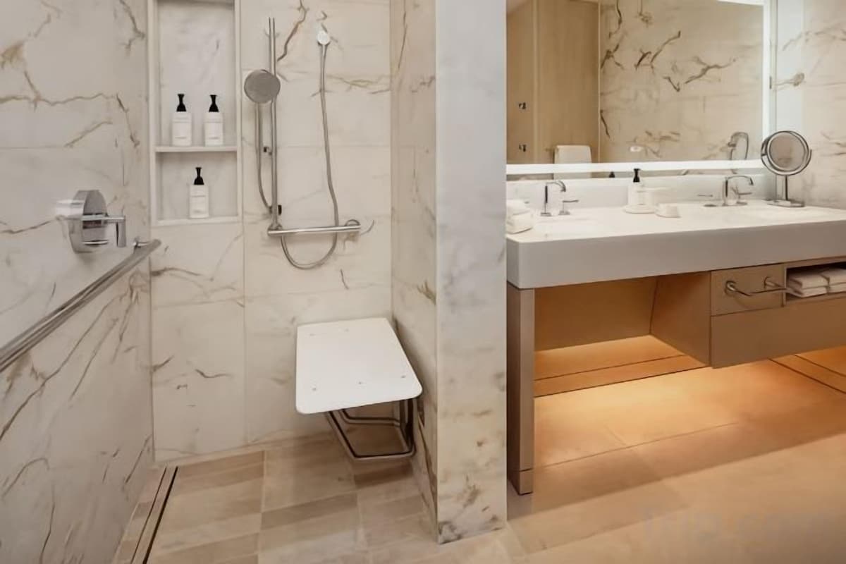 Designer toiletries, hair dryer, bathrobes, slippers