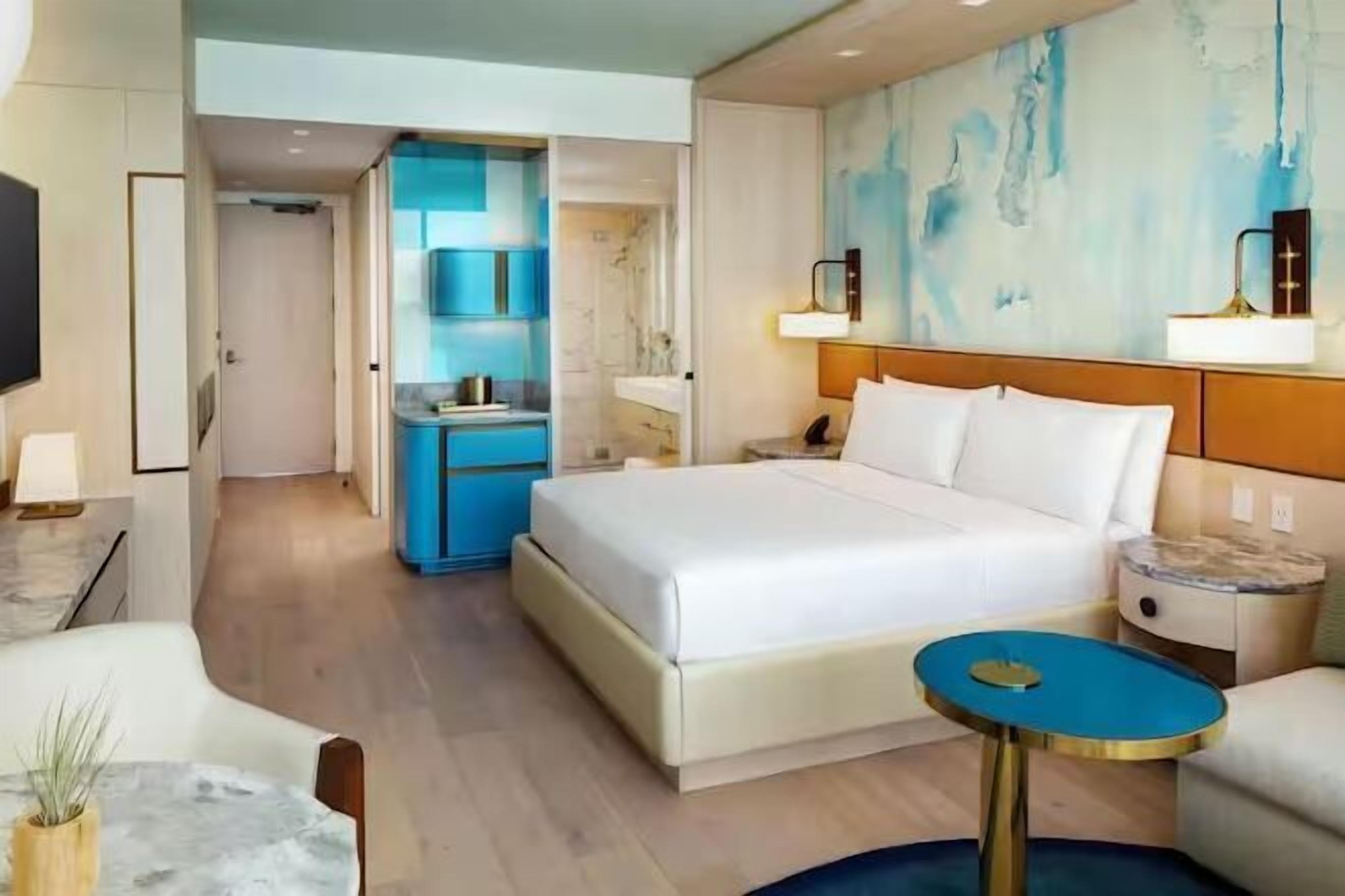 Hypo-allergenic bedding, minibar, in-room safe, desk